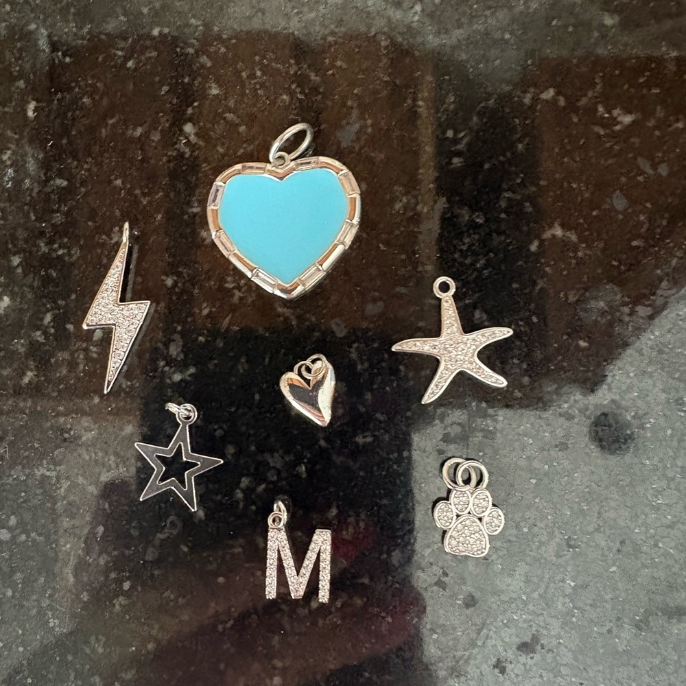 Multiple Silver Charms for sale!